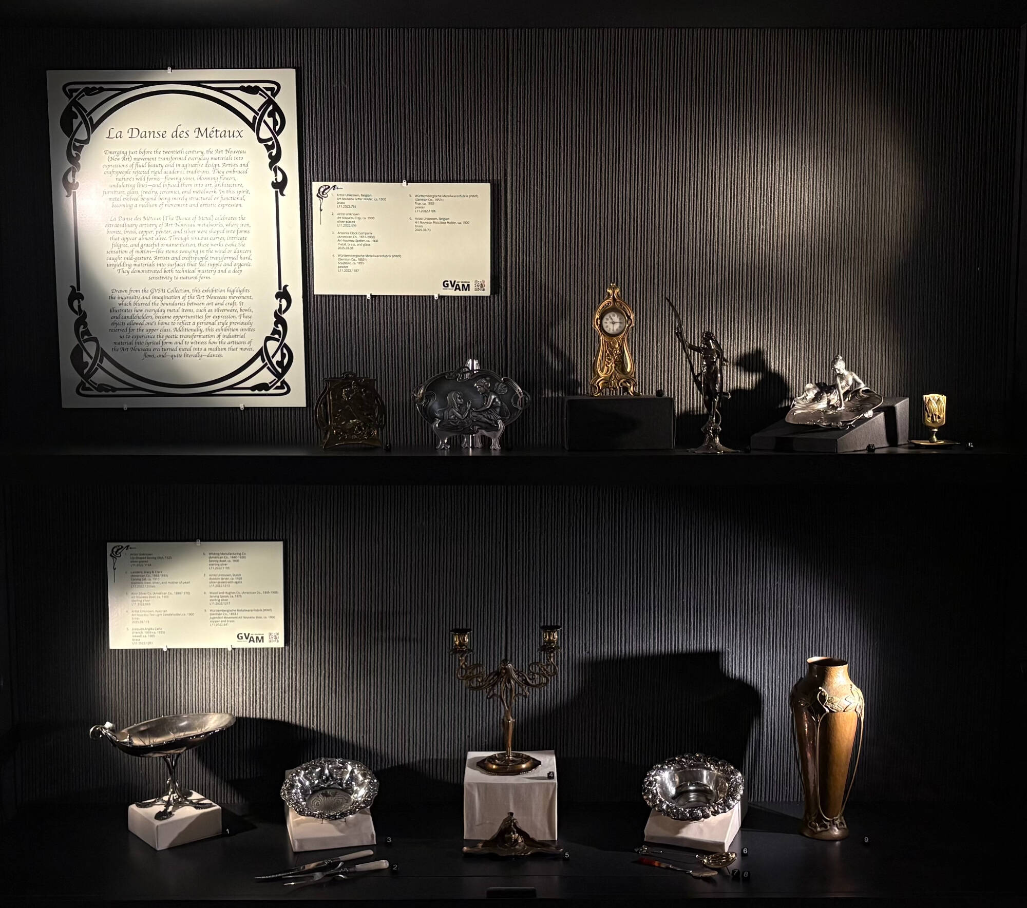 Interior of the case showcasing the exhibition, La Danse des Métaux